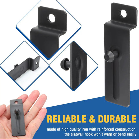 Close-up of a hand holding a 30 Pcs Metal Slatwall Hooks, 3 Inch Notch Hooks, Built Tough Heavy Duty Commercial Grade, black finish