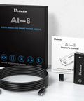 Guitar Audio Interface Plug And Play Portable Recording Sound Card For Live Streaming On IPhone Ipad And Android Phones And Tablets No Driver Needed OTG Ready with accessories and packaging on table.