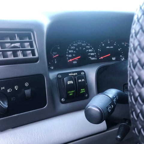 Two Gang Rocker Panel With Dual Green LED Illumination, 12 24V DC Pre Wired Harness, Plug And Play Easy Install 5 Pin SPST Toggle Switches installed in car dashboard