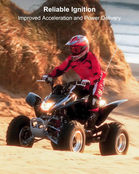 Person riding ATV in sand dunes with Reliable Ignition text above