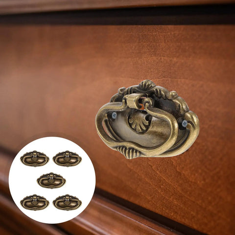 Stylish Metal Case Handles And Wooden Drawers Pulls For Cabinet Knobs Replacement Kit, Durable Hardware For Dresser And Cupboard With Easy Install And Exquisite Look That Slays. Bronze oval metal drawer pull on wooden cabinet, close-up with 5-piece set inset.