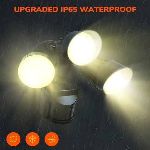 4000LM LED Security Flood Light With Motion Sensor For Outdoor Use illuminated in rain showcasing IP65 waterproofing