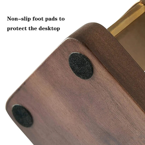 Close-up of non-slip foot pads on Boss Grade Wood And Copper Espresso Tamper Station for desktop protection.