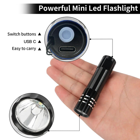 Close-up of a USB-C charging port and compact design of 6 Pack LED Aluminum Mini USB C Rechargeable Handheld Flashlights in hand.