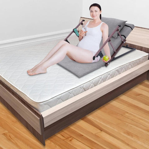 Upgrade Your Sleep Game With This Electric Power Lifting Bed Back Rest, woman seated at 70-degree angle with remote in gray style.