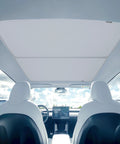 Installed OtriFowd Tesla Model Y sunshade for glass roof, light gray, foldable magnetic shade
