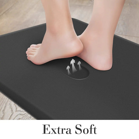 Feet stepping on black Ergonomic Anti Fatigue Kitchen Floor Mat Set 17.3 By 28 Inches And 17.3 By 60 Inches Cushioned Waterproof PVC