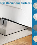 Brushed metal door stopper wedge with adjustable spring, 3-inch tall, placed at door bottom on carpet.