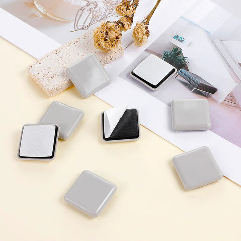 Heavy Duty Self Adhesive Furniture Sliders 12 Pack Quick Stick Eva Foam Moving Pads on display with peel-off backing.