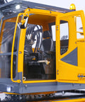 1 14 RC Model Metal Hydraulic Aoue ET30H Wheeled Excavator With Full Metal Frame High Torque Motor ESC Servo LED Light Kit Realistic Working Pistons Durable Construction For Serious RC Nerds And Builders. Close-up of the cab and LED light.