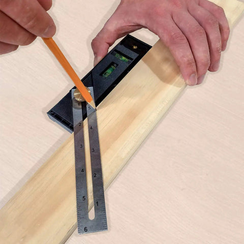 Hand using Straight Shooter Nine In One Measuring And Marking Tool Featuring Dual Levels Sliding Bevel for precise marking.