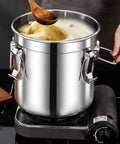 Pantry Game Changer 304 Stainless Steel Airtight Food Storage Canister large capacity on stove with food being stirred.