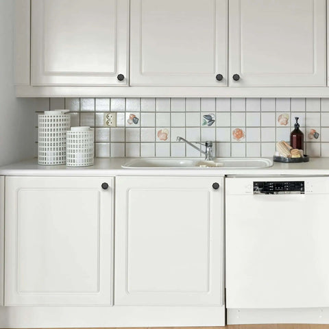 Slick Matte Black Round Cabinet Knobs Featuring A Sleek Zinc Body And Single Hole Mounting For Fresh Kitchen Drawers Or Bathroom Vanities Straight Up Pro Grade Durability With A Tight Fit Set Of 10 on white cabinetry.