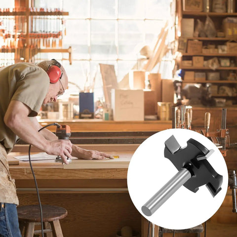 Man using CNC Spoilboard Surfacing Router Bit With 1/4 Inch Shank, Extra Large 1-1/2 Inch Cutting Diameter For Slab Flattening in a workshop.