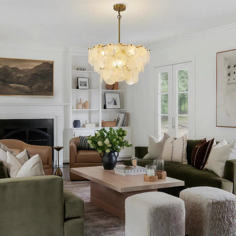 23 Inch 9 Light Gold Glass Chandelier 3 Tier Round Crystal Pendant Light Height Adjustable illuminating a stylish living room.