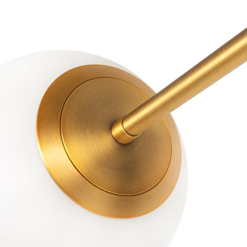 Close-up of the brushed gold fixture and frosted globe of the Brushed Gold Five-Globe Semi-Flush Mount Light With Dope Mid-Century Vibe.
