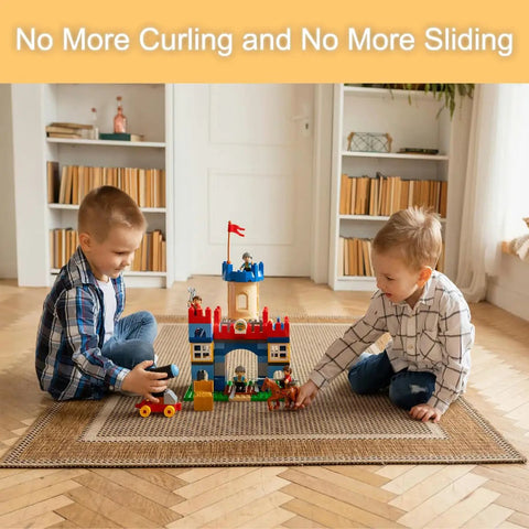 Two children playing on flat rug secured by Triangular Anti Slip Rug Grippers For Flat Rugs Reusable And Washable Clear 8 Pack on hardwood floor.