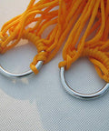 Metal hanging loops of Outdoor Nylon Rope Hammock Swing With Mesh Seat, Ultra Breathable Hanging Bed, vibrant orange