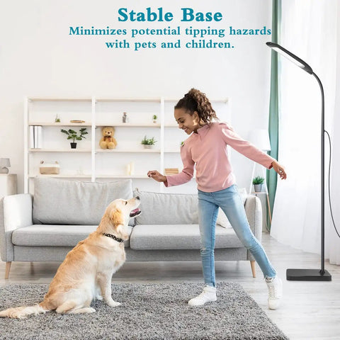 Girl plays with dog near Totally Adjustable Gooseneck Floor Lamp With 3 Color Temperatures And Stepless Dimmer, stable and safe base.
