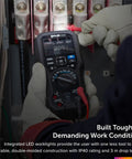 Person using Industrial Grade Thermal Imager And Multimeter for electrical inspection with LED worklights.