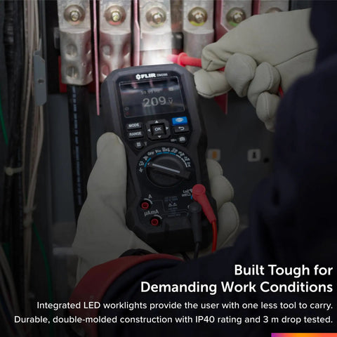 Person using Industrial Grade Thermal Imager And Multimeter for electrical inspection with LED worklights.