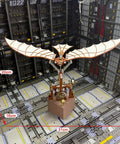 Da Vinci Flapping Wing DIY Model Kit 3D Metal Wind Up Ornithopter in mechanical setting, dimensions 20cm x 16cm x 31cm.