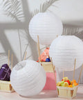 Easy DIY Hot Air Balloon Centerpieces Kit With White Paper Lanterns 24 Lanterns 24 Wooden Baskets And 100 Sticks displayed