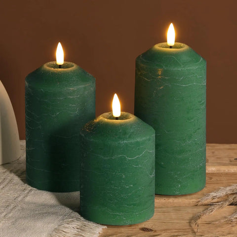 Green Christmas Flameless Pillar Candles With Remote Control Battery Powered Led Wax Candles Real Wax Look And Flicker Flames Cone Top Design With Lifelike Wicks 3 Pack For Cozy Holiday Vibes on wooden table