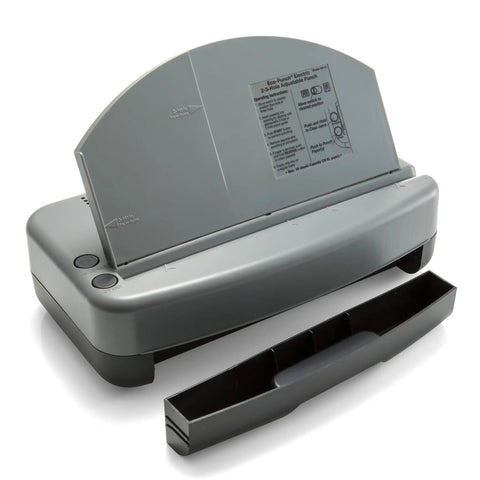 Electric Desktop 2 To 3 Hole Punch With 30 Sheet Capacity, gray and black finish, shown with paper guide and chip tray removed.