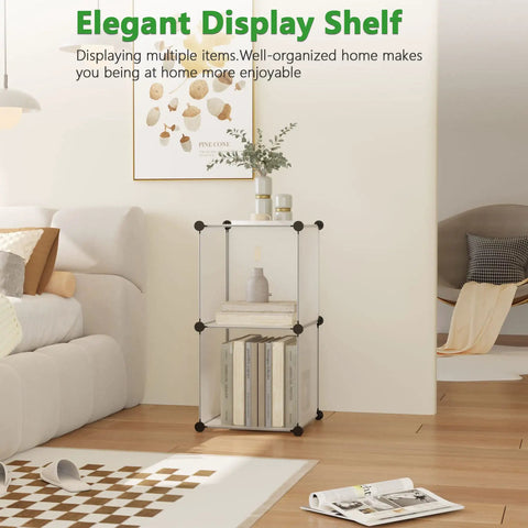 Two Cube Storage Organizer Unit For Bedroom Living Room And Office, Plastic Closet Shelving Shelf, DIY Modular Bookcase, White Cube Cabinet With 2 Open Compartments, Space Saver, Easy Assembly, 12.4 X 12.4 X 24.8 Inches displayed in a living room.