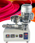 Compact 1000W Desktop 3D Printer Filament Maker Single Screw Extruder with a bowl and digital display for pellets.