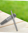 Double Head Screw Extractor Set For Stripped Screws And Broken Water Pipes on a wooden surface