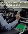 Driver using VLinker FD Plus OBD2 Bluetooth Diagnostic Scanner in car, visible on central console, Real Time Code Reading and Clearing