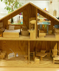 Wooden dollhouse interior featuring a Dollhouse Science Lab Mini Kit with glass test tubes and wood rack in one twelfth scale.