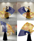 A dancer with soft chiffon worship flags for dance, displaying fluid moves in vibrant colors during a performance.