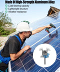 Worker installing 20 Pack Solar Panel Clamps For Unistrut Rails And Wide PV Mounts, Mid Mount Bracket on solar panels.