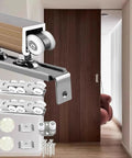 Heavy Gauge Aluminum Sliding Door Hardware Kit With Waterproof Overhead Track Featuring Dead Silent Dual Roller Carriages And Rust Proof Adjusted Rails For Smooth Barn Door Upgrades And No Sweat DIY Setups close-up of roller and track system