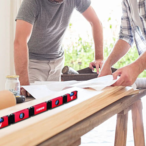 Two people working with Foldable 28 Inch Magnetic Level With 45 90 180 Bubble Angles, Pro Grade Hinged Measuring Tool on a wooden surface