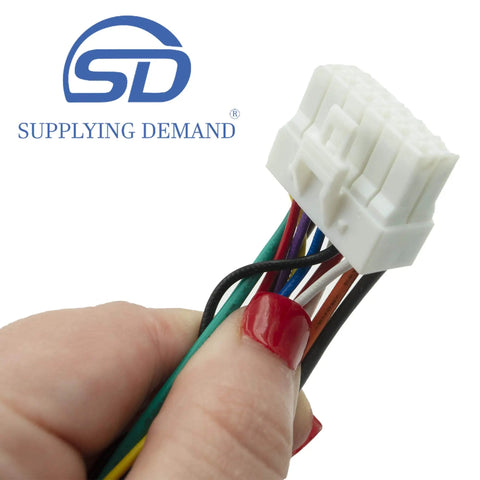Close-up of Refrigerator Ice Maker Assembly Replacement DA97-07592A 2051096 12-pin connector held in hand.