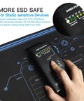 Hand testing conductivity on 24x16 Inch Anti Static Rubber Mat Kit For ESD Sensitive Electronics Repair Soldering PC Building And Assembly
