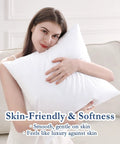 Woman holding 20x20 Outdoor Pillow Inserts Set Of 2 With Waterproof Fabric Down Alternative Cushions on a sofa.