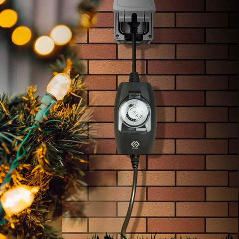 Heavy Duty Outdoor Light Timer With Plug And Play Programming And Hella Tough Grounded Outlet Boasting Up To 48 Daily On Off Cycles For Weather Ready Garden And Yard Lighting Setups mounted on brick wall with holiday lights.