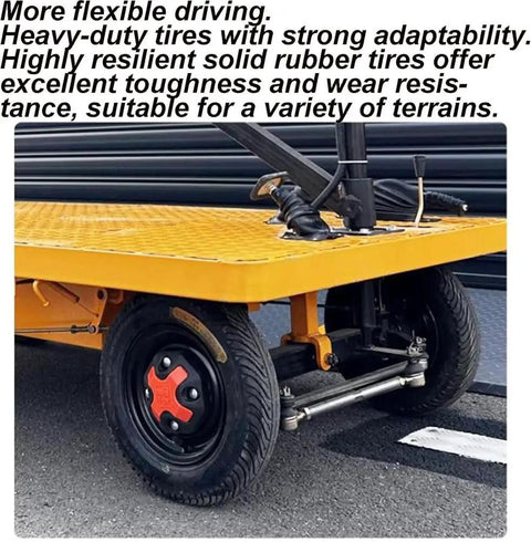 Huge Heavy Duty Electric Platform Truck Cart That Folds Like A Dream For Moving Groceries And Warehouse Gear With Slip Resistant Surface Holding Up To 2K Lbs tire close-up showing durable solid rubber construction for various terrains.