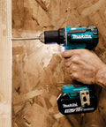 Using 18V LXT Brushless Cordless Half Inch Drill Driver Kit with 3.0Ah Battery on wood surface