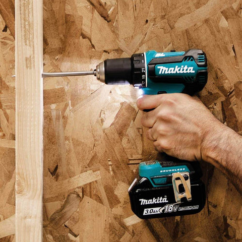 Using 18V LXT Brushless Cordless Half Inch Drill Driver Kit with 3.0Ah Battery on wood surface