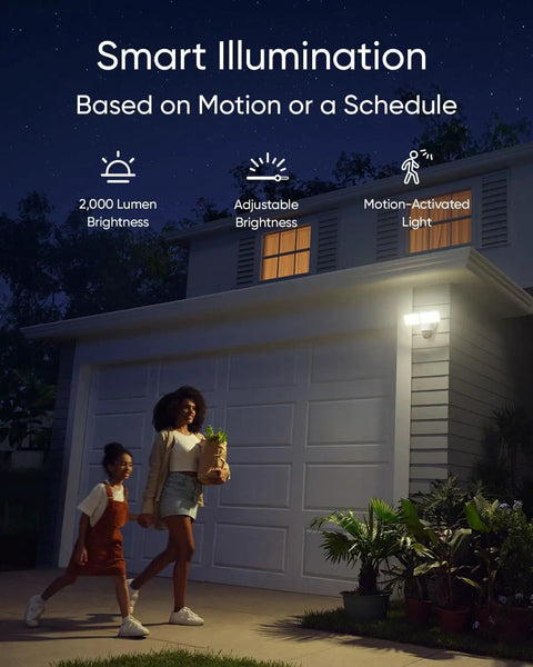 Dual-Lens 360 Coverage Outdoor Floodlight Security Cam With Pan And Tilt AI Detection And Tracking 8x Hybrid Zoom 2K And 3K Resolution 24 Seven Recording No Monthly Fee Wired Dual-Band WiFi 6 2000 Lumen installed on a house illuminating a driveway at night