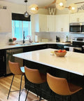 Modern kitchen with contrasting cabinetry refinished using All In One Refinishing Paint For Furniture Cabinets And More Gallon Licorice No Stripping No Sanding No Priming Needed Quick Application And Rich Durable Finish For Dyi Makeovers, with elegant countertops and lighting.