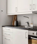 Modern kitchen with cabinets fitted with 10 Pack 5 Inch Hole Centers Polished Chrome Cabinet Pulls, polished finish