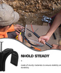 100 Pack Black 25mm Plastic Half Clamp Fixtures With Steel Nails for pipe and cable management in workshops, installation view