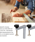 20mm Solid Hold Down Clamp With Hella Tough Grip And Fast Acting Gear Lock For Workbench Saw Holes in use, clamping wood pieces securely.